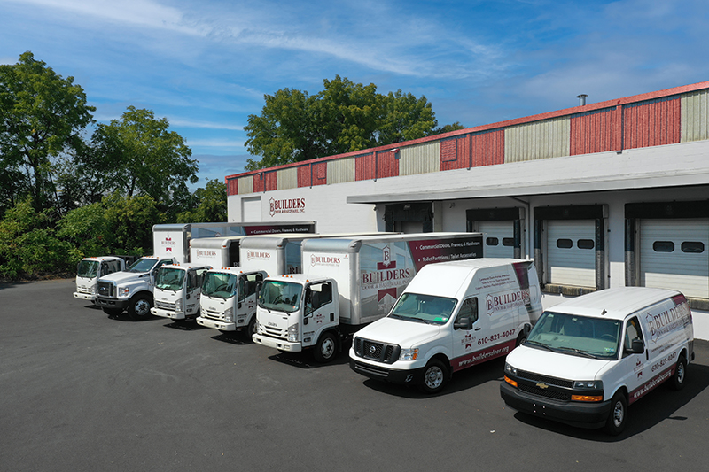 a fleet of builder's door trucks